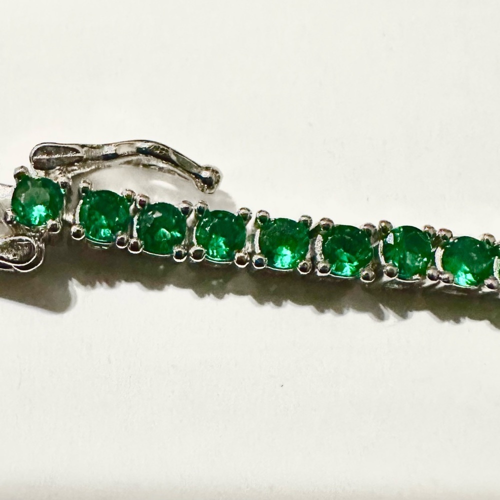 Sterling Silver and lab created emerald 8” bracelet